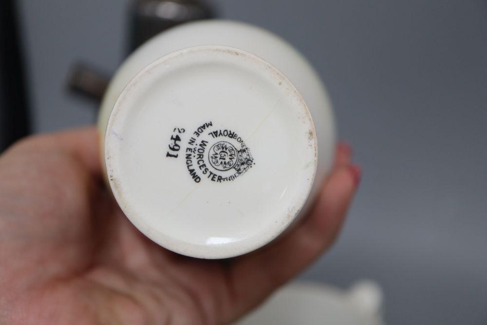 A quantity of mixed ceramics and a cocktail shaker